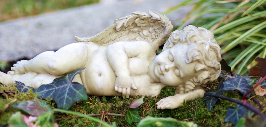 Lying angel on grave Lying angel on grave