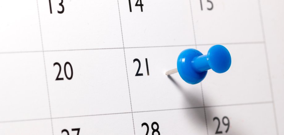 Blue pin on Calendar
