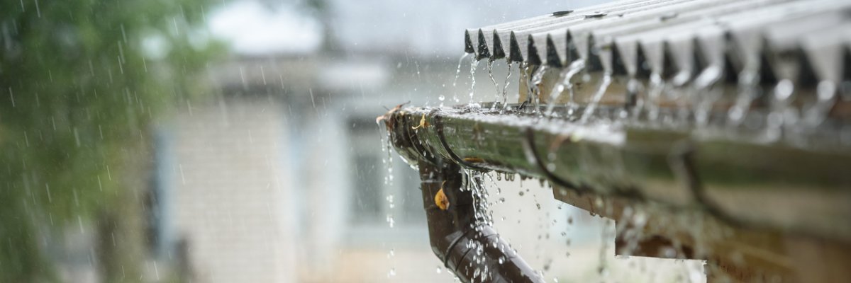 rain flows down from a roof down rain flows down from a roof down