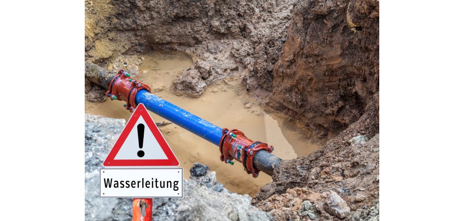 Water pipe burst Warning sign in German